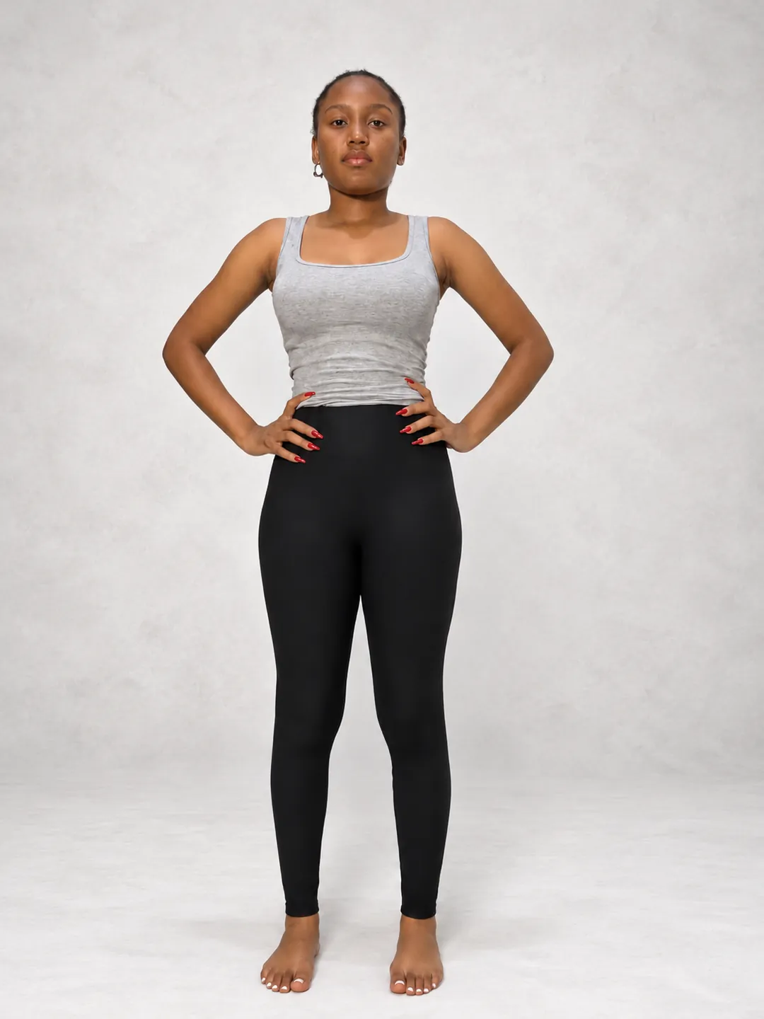 Digital, full length: grey vest and black leggings